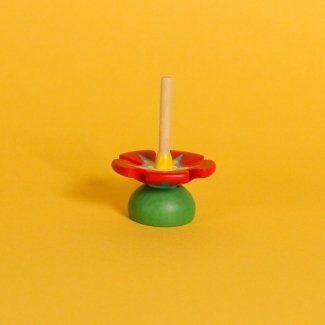Toupie en bois fleur