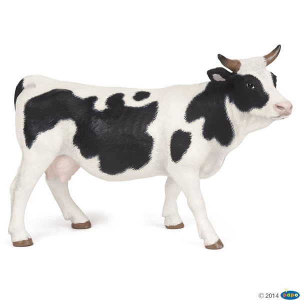 Figurine vache noire et blanche